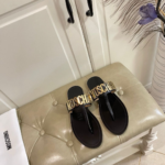 Moschino Sandale "Black Golden"