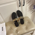 Moschino Sandale "Black Golden"