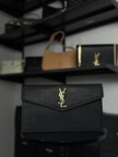 YSL Saint Laurent Uptown crna/zlatna