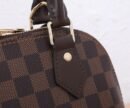 Louis Vuitton black brown bag